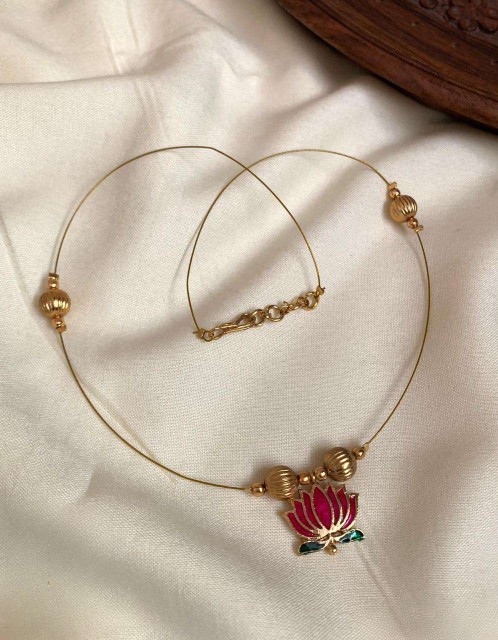 Compress_20250630_215656_6364 INVISIBLE LOTUS NECKLACE - Image 1