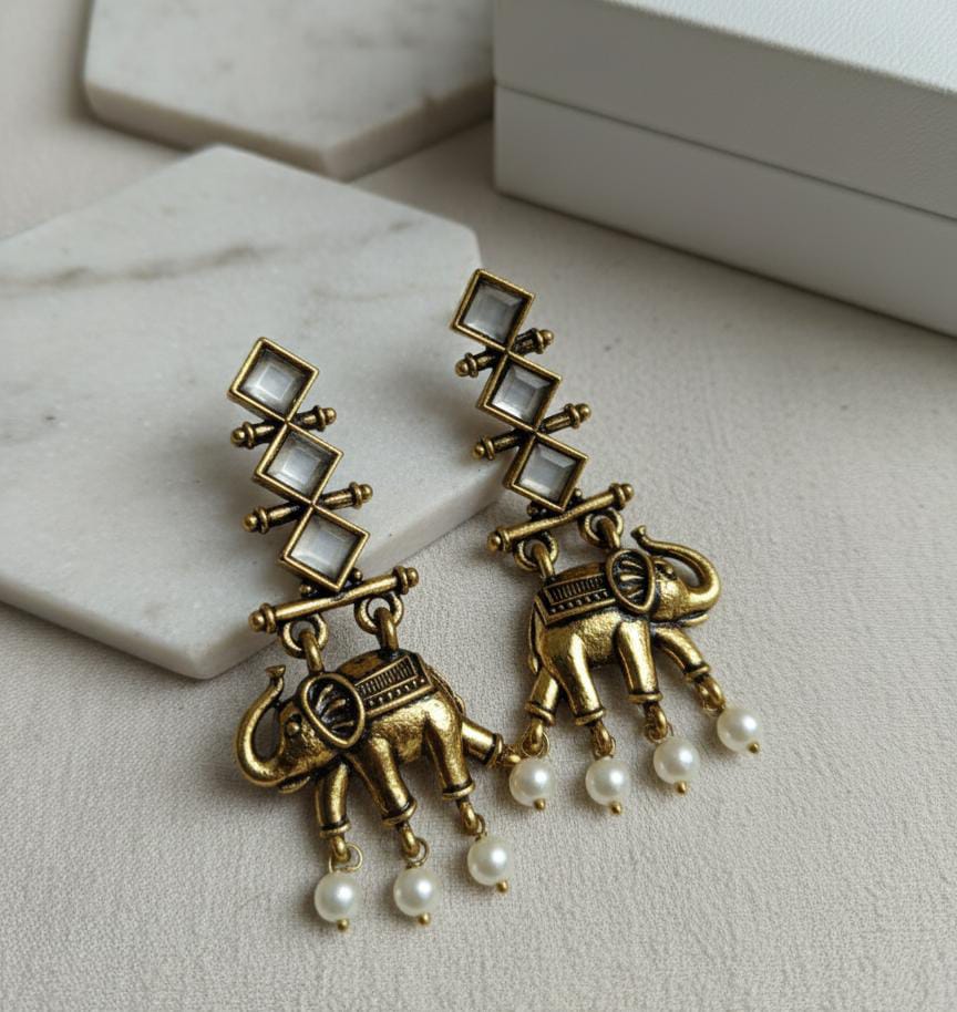 IMG-20250924-WA0015 PREMIUM TUSKER EARRINGS - Image 1